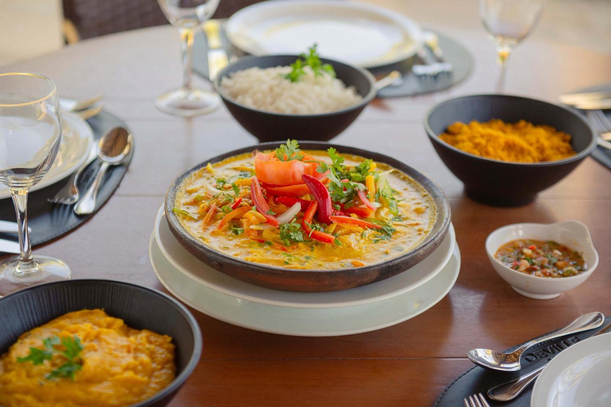 Hotel Deville Prime Salvador Bagian luar foto Indian cuisine