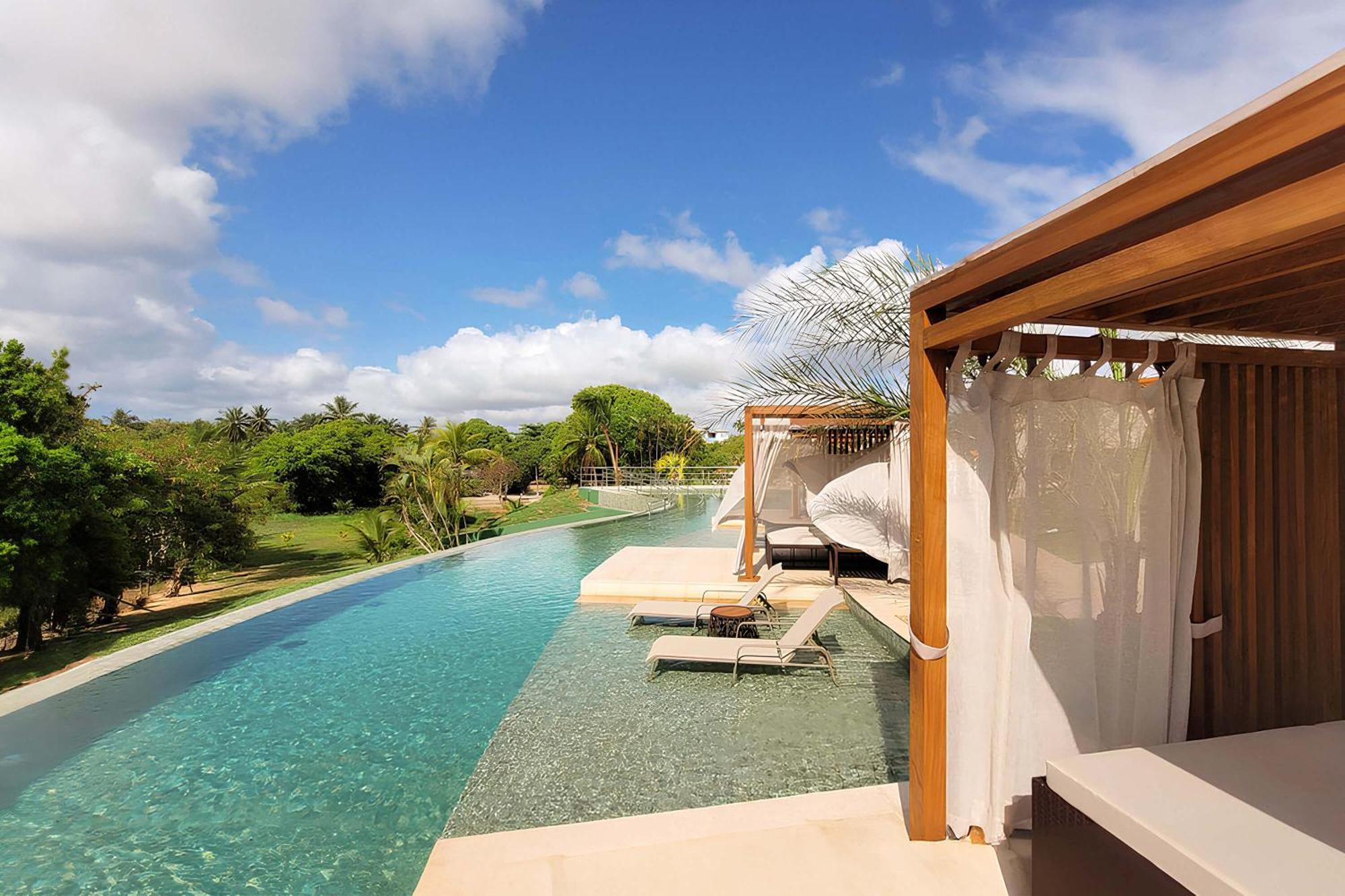 Hotel Deville Prime Salvador Bagian luar foto The swimming pool at the hotel